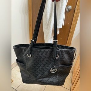 Black Michael Kors designer handbag